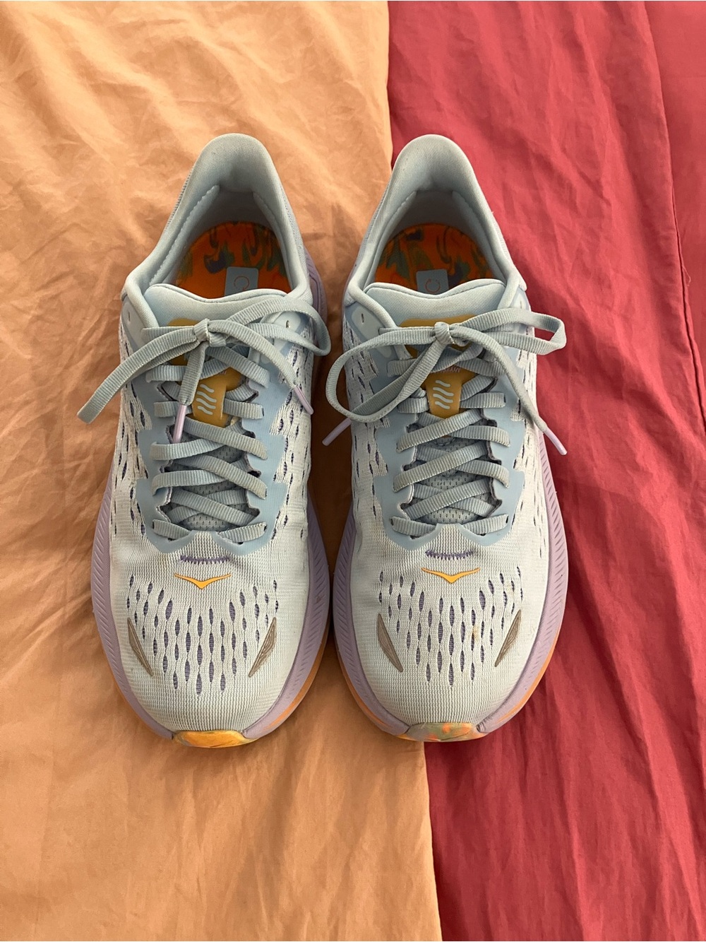Hoka Women's Light Blue Running Shoes with Lavender and Yellow Accents